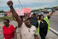 Protestors march down in Ferguson, Missouri