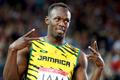 Bolt of Jamaica gestures before competing in a heat of the men's 4x100m relay at the 2014 Commonwealth Games in Glasgow