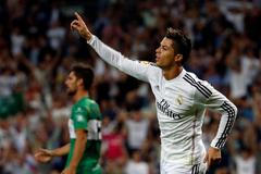Real Madrid's Ronaldo celebrates after scoring his second goal against Elche during their Spanish first division soccer match in Madrid