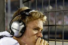 Mercedes Formula One driver Rosberg of Germany watches the race from the pitwall during the Singapore F1 Grand Prix in Singapore