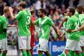 VfL Wolfburg's Ricardo Rodriguez celebrates with teammates after scoring against Bayer Leverkusen during the German Bundesliga first division soccer match in Wolfsbur