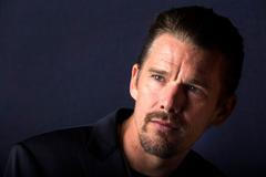 File picture shows Hawke posing while promoting his film "Seymour: An Introduction" at Toronto International Film Festival