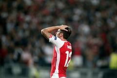Arsenal's Grioud reacts during the first leg of their Champions League qualifying soccer match aganist Besiktas
