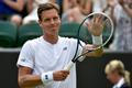 Tomáš Berdych se raduje z postupu do druhého kola Wimbledonu 2014