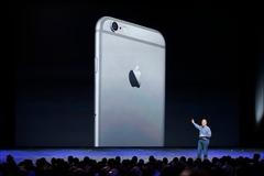 Phil Schiller, Senior Vice President at Apple, Inc. speaks about the iPhone 6 during an Apple event at the Flint Center in Cupertino