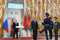 Russia's President Putin and Belarus' President Lukashenko take part in a ceremony to mark the 70th anniversary of the liberation of Belarus from Nazi occupation, at the Belarusian State Museum of the