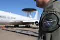 The patch of the NATO AWACS aircraft is seen attached to the uniform of an officer before boarding for a surveillance flight over Romania from the AWACS air base in Geilenkirchen near the German-Dutch