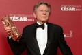 Roman Polanski poses with Best Director award for "La Venus A La Fourrure" at the 39th Cesar Awards ceremony in Paris