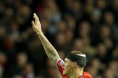 Martin Škrtel slaví gól Liverpoolu