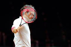 Roger Federer při tréninku švýcarské daviscupové reprezentace.