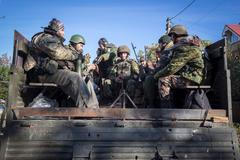 Proruští rebelové u letiště v Doněcku