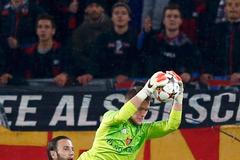 FC Basel's goalkeeper Vaclik saves in front of Marcelinho of Ludogorets during Champions League match in Basel
