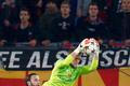 FC Basel's goalkeeper Vaclik saves in front of Marcelinho of Ludogorets during Champions League match in Basel