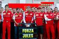 Members of Ferrari Formula One team pose with a sign in support of Marussia Formula One driver Bianchi of France before the first Russian Grand Prix in Sochi