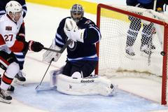 Ondřej Pavelec v přípravě na NHL 2014-15