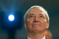 Astronomer Churyumov reacts after successful landing of Philae lander on comet 67P/ Churyumov-Gerasimenko in Darmstadt