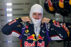Red Bull Formula One driver Sebastian Vettel of Germany prepares for the third free practice session at the Russian F1 Grand Prix in the Sochi Autodrom circuit