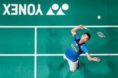File photo of Malaysia's Lee Chong Wei hitting a return during his men's singles final match against Indonesia's Tommy Sugiarto at the Malaysian Open Super Series 2014 badminton tournament in Kuala Lu