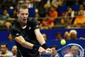 Singapore Slammers' Tomas Berdych of the Czech Republic hits a return to Manila Mavericks' Jo-Wilfried Tsonga of France during their men's singles match at the International Premier Tennis League (IPT