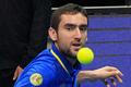 Cilic of the UAE Royals eyes the ball during his men's singles match against Berdych of the Singapore Slammers during the International Premier Tennis League in Manila