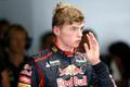 Toro Rosso Formula One driver Verstappen of the Netherlands returns to the garage after his car stalled on the track during the first practice session of the Japanese F1 Grand Prix at the Suzuka Circu