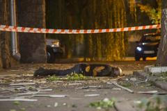 Oběť před budovou Mezinárodního červeného kříže v Doněcku