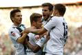 Borussia Mönchengladbach's Korb, Hahn, Nordtveit and Kruse celebrate a goal against Hoffenheim during the Bundesliga first division soccer match in Moenchengladbach