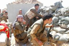 Kurdští bojovníci u Kirkúku v Iráku.