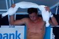 Tomas Berdych of Czech Republic holds an ice-packed towel during his men's singles match against Damir Dzumhur of Bosnia and Herzegovina at the Australian Open 2014 tennis tournament in Melbourne