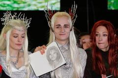 Fans wait along the red carpet at the world film premiere of "The Hobbit: The Battle of the Five Armies" at Leicester Square in central London