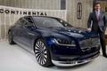 Ford Motor Co. CEO Fields poses with the Lincoln Continental concept car at an event ahead of the New York International Auto Show in New York