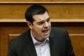Greek PM Tsipras addresses lawmakers during a parliamentary session in Athens