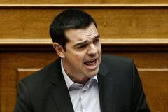 Greek PM Tsipras addresses lawmakers during a parliamentary session in Athens