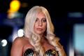 Singer Lady Gaga poses for the media upon her arrival at the Athens' Eleftherios Venizelos airport
