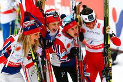 Team Norway celebrates winning the women's cross country free/classic 4 x 5 km relay final at the Nordic World Ski Championships in Falun