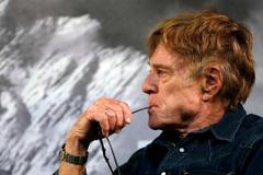 Robert Redford addresses the media at an opening day news conference for the Sundance Film Festival in Park City, Utah