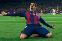 Barcelona's Suarez celebrates after scoring a goal against Real Madrid during their Spanish first division "Clasico" soccer match at Camp Nou stadium in Barcelona