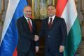 Russia's President Putin shakes hands with Hungarian Prime Minister Orban during their meeting in Budapest