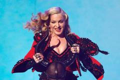 Madonna performs "Living for Love" at the 57th annual Grammy Awards in Los Angeles