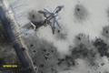 Still image taken from handout aerial footage shot by drone shows outline o airplane in the snow at the Sergey Prokofiev International Airport damaged by shelling during fighting between pro-Russian s