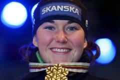 Šárka Strachová (ještě pod dívčím jménem Záhorbská) se zlatou medailí ze slalomu na MS v Aare 2007