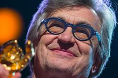 Director Wenders accepts an Honorary Golden Bear at the 65th Berlinale International Film Festival in Berlin