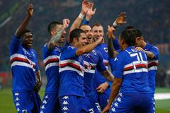 Sampdoria's Muriel celebrates with his team mates after scoring against AS Roma in their Italian Serie A soccer match at the Olympic stadium in Rome