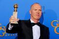 Michael Keaton poses backstage with his award for Best Actor in a Motion Picture, Musical or Comedy for his role in "Birdman" at the 72nd Golden Globe Awards in Beverly Hills