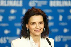 French actress Binoche attends news conference at 65th Berlinale International Film Festival in Berlin