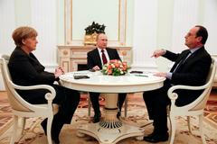 Merkelová - Putin - Hollande v Kremlu