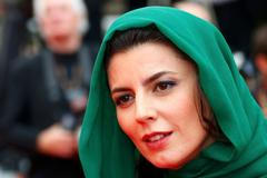 Jury member actress Leila Hatami poses on the red carpet as she arrives for the screening of the film "Jimmy's Hall" in competition at the 67th Cannes Film Festival in Cannes