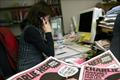 Novinářka v redakci týdeníku Charlie Hebdo
