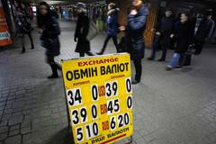Kurz ukrajinské hřivny, tabule v centru Kyjeva