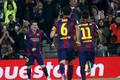 Barcelona's Lionel Messi celebrates his second goal with teammates Xavi Hernandez and Neymar against Getafe during their Spanish first division soccer match at Nou Camp stadium in Barcelona